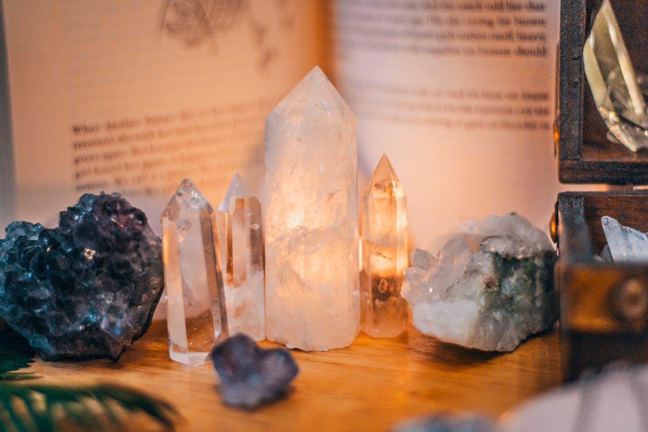 The Art of Drawing Readers In: Your attractive post title goes here Close-up of various healing crystals on a wooden table with warm lighting